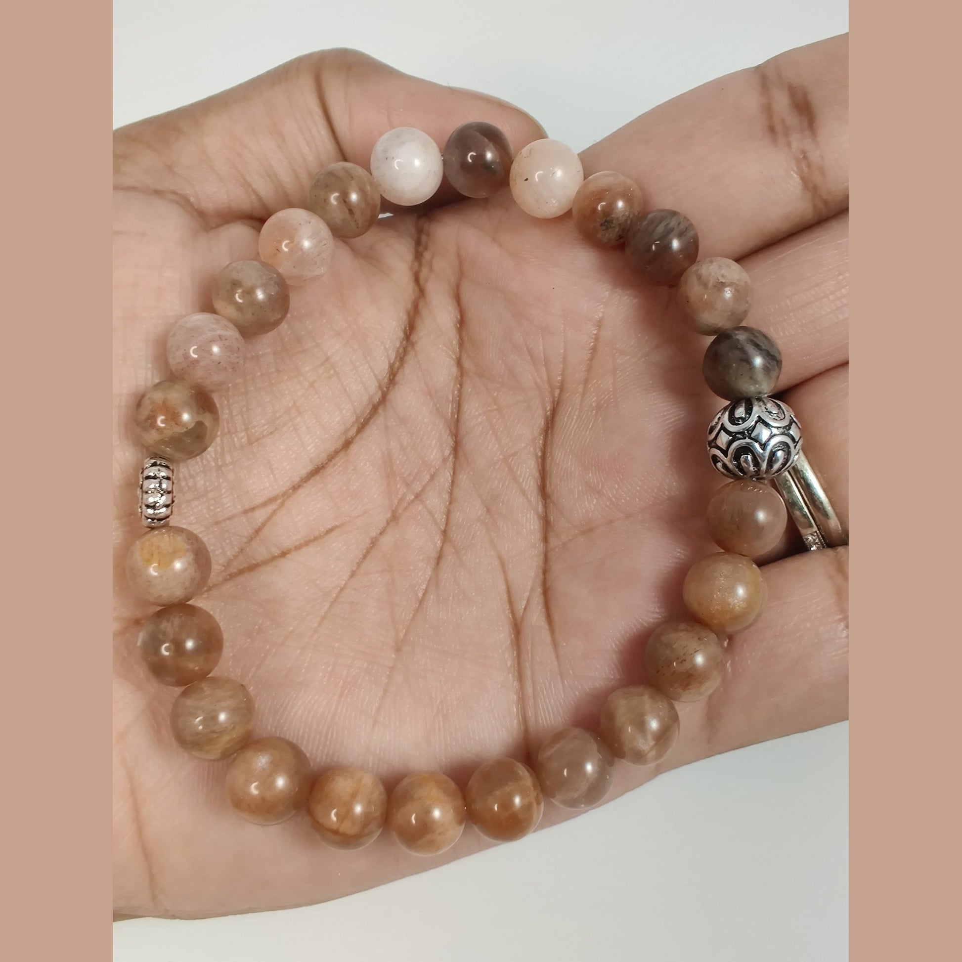 Peach moonstone and flower sunstone bracelet with silver tone daisy spacer and antique silver daisy capped round bead image 4