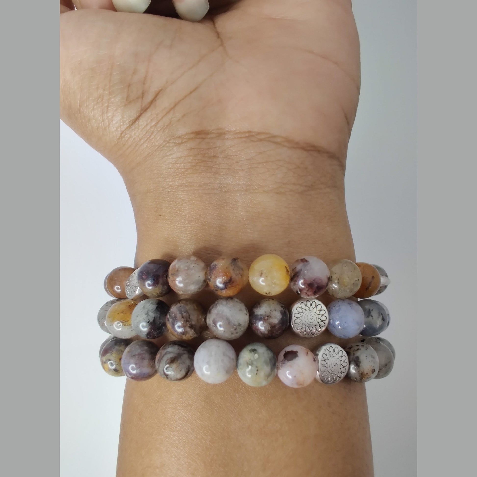 Black dendritic opal, pietersite, and lodolite stretch bracelet with silver tone flower spacers and antique silver (plated) basket round bead image 4