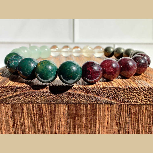 Bloodstone, citrine (A), garnet, green aventurine, and pyrite stretch bracelet