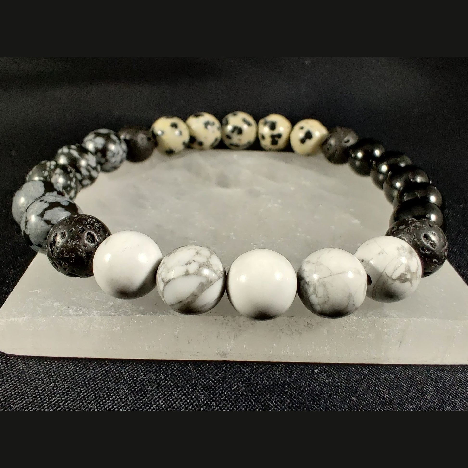 Howlite, snowflake obsidian, black tourmaline, and dalmatian jasper bracelet with lava rock image 0