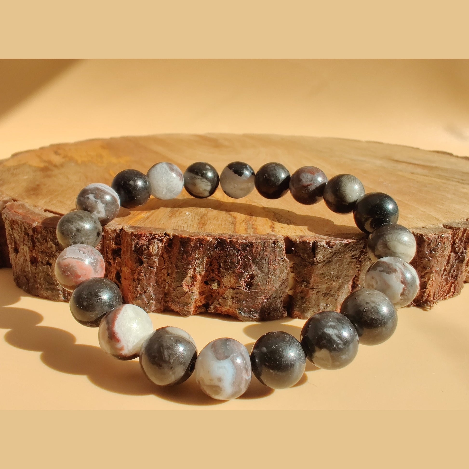 Mexican zebra jasper and orthoceras fossil stretch bracelet image 0
