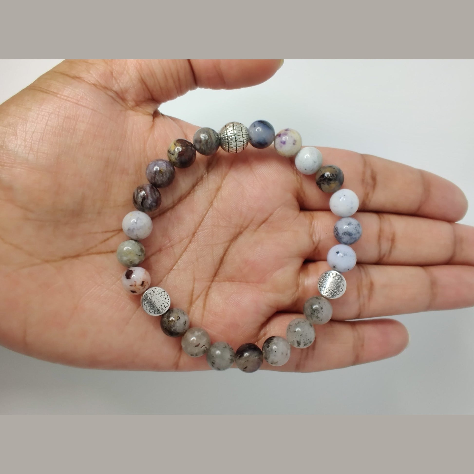 Black dendritic opal, pietersite, and lodolite stretch bracelet with silver tone flower spacers and antique silver (plated) basket round bead image 3