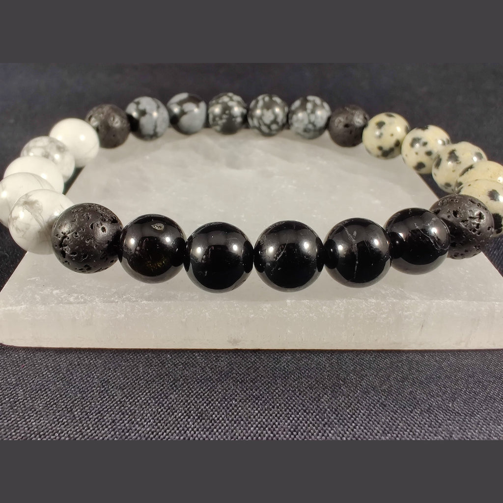 Howlite, snowflake obsidian, black tourmaline, and dalmatian jasper bracelet with lava rock image 3