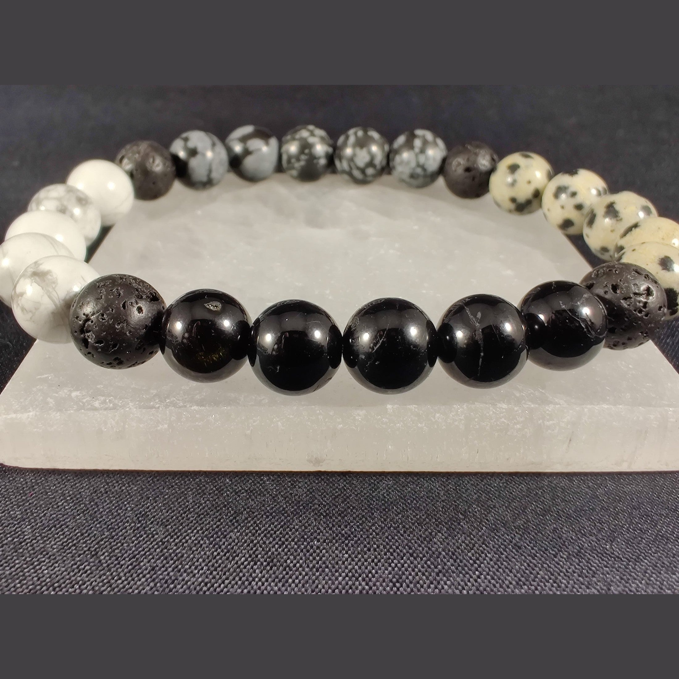 Howlite, snowflake obsidian, black tourmaline, and dalmatian jasper bracelet with lava rock image 3