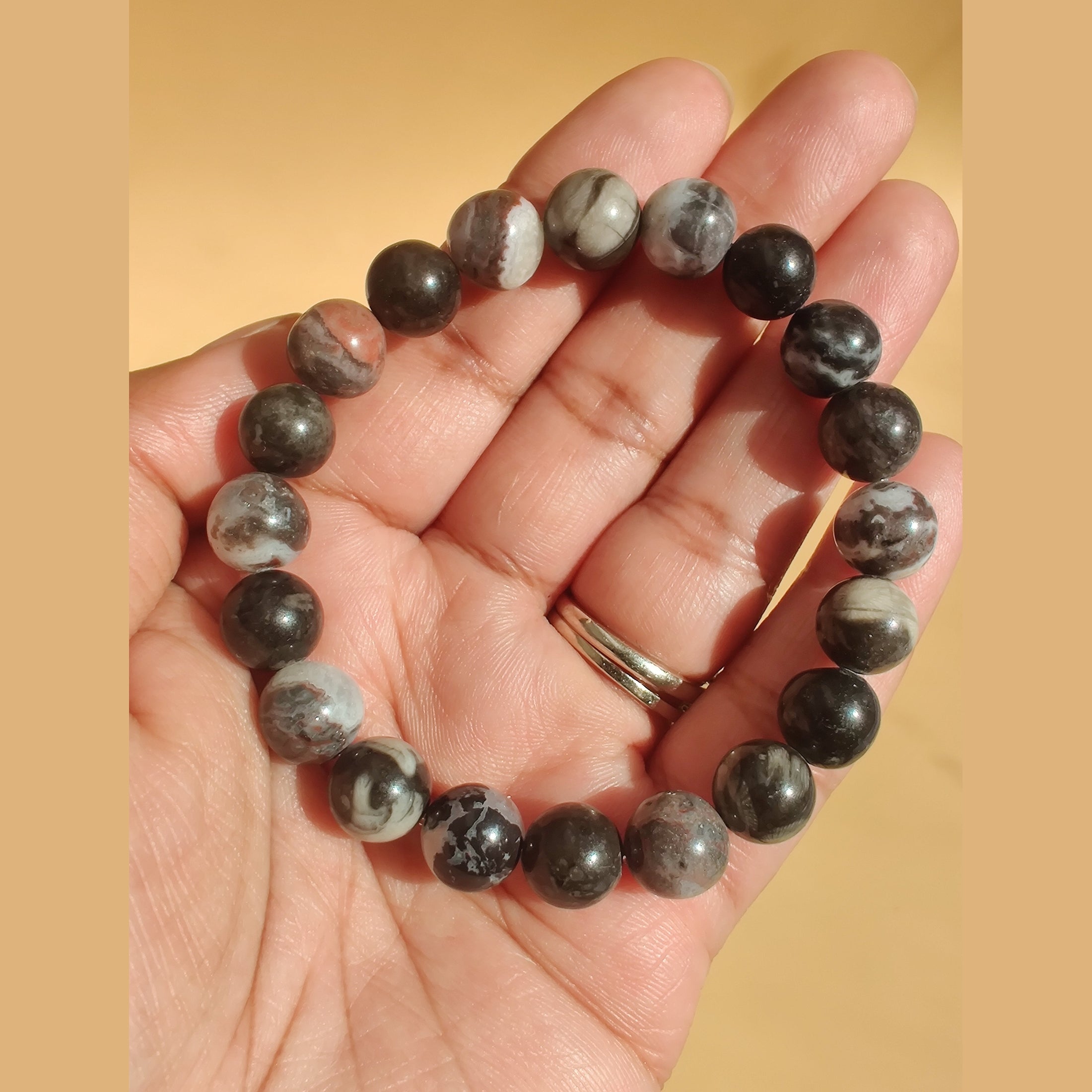 Mexican zebra jasper and orthoceras fossil stretch bracelet image 1