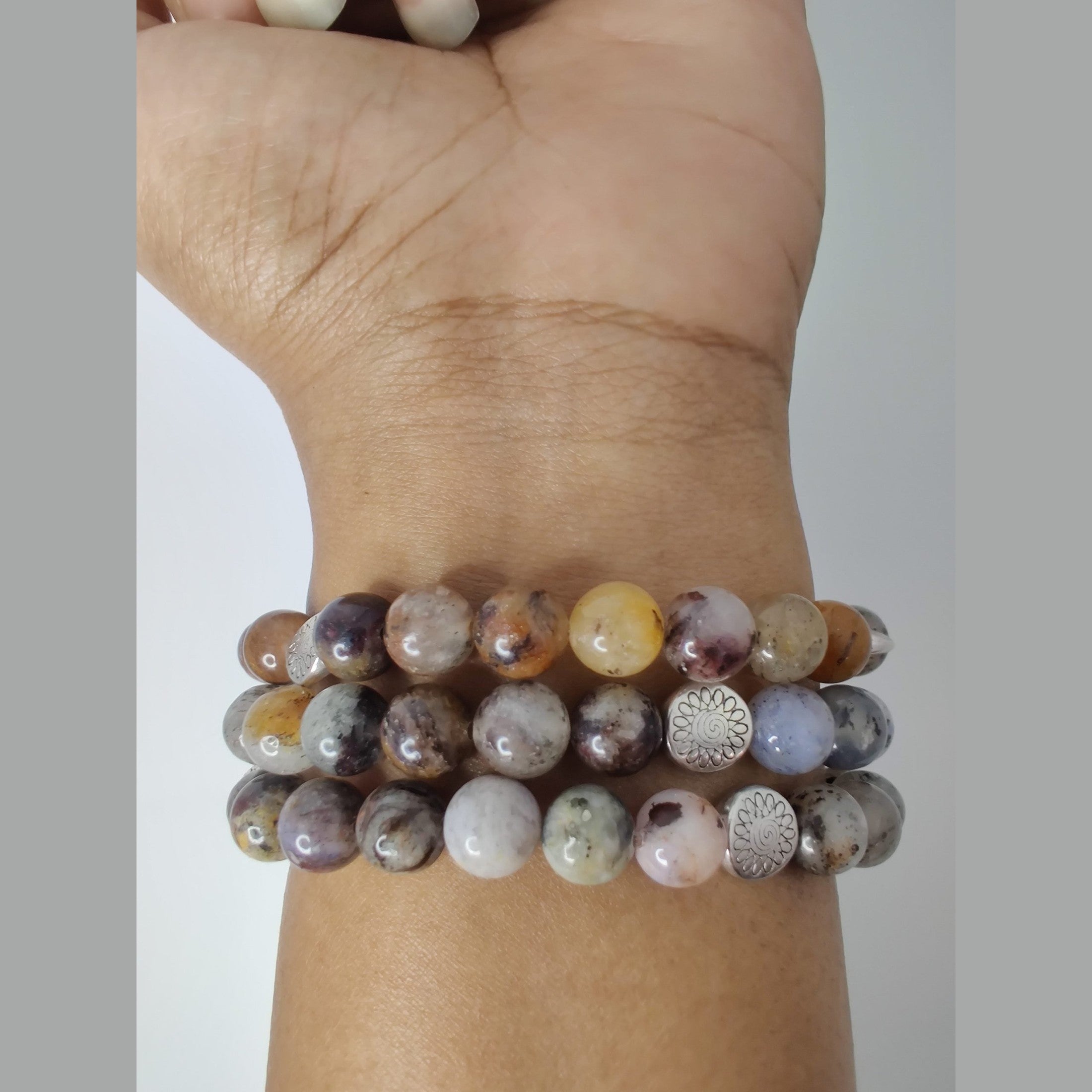 Black dendritic opal, pietersite, and lodolite stretch bracelet with silver tone flower spacers and antique silver (plated) basket round bead image 4