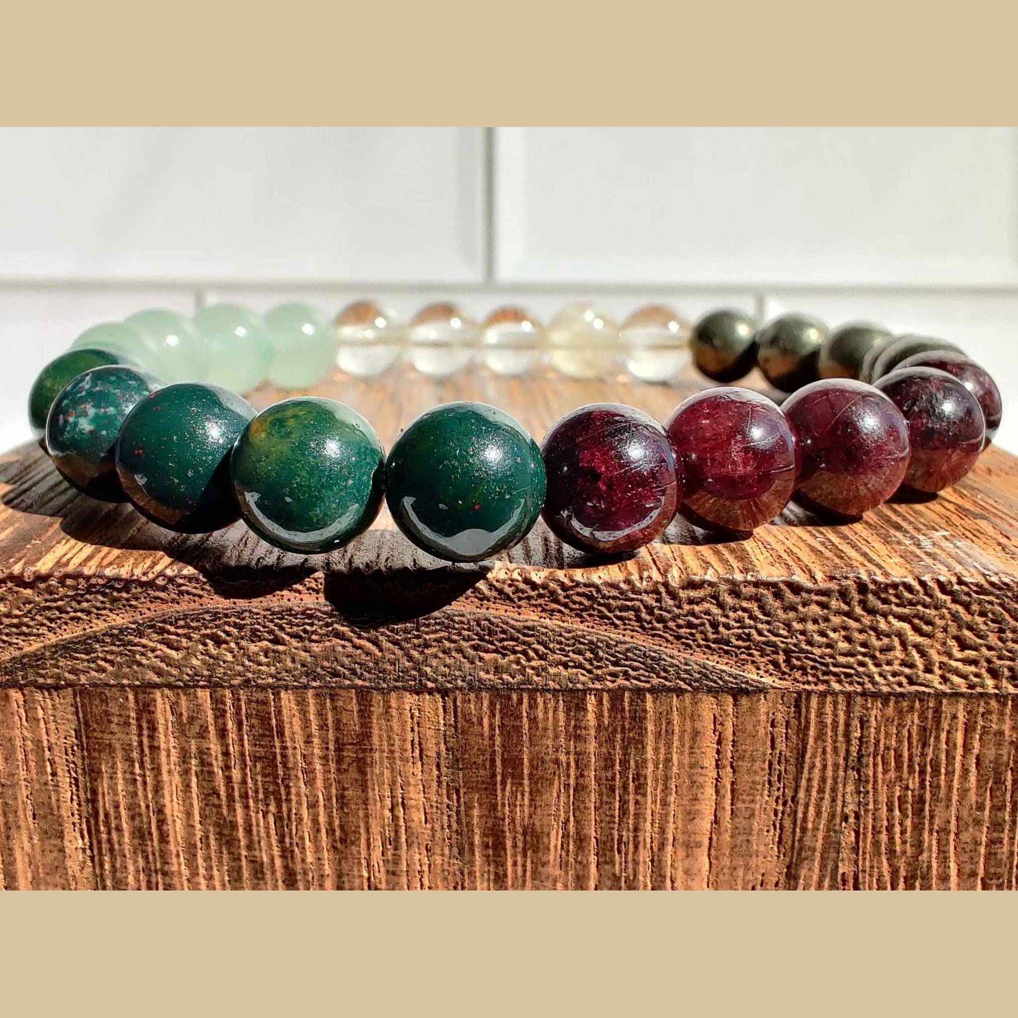 Bloodstone, citrine (A), garnet, green aventurine, and pyrite stretch bracelet