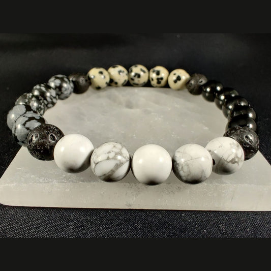 Howlite, snowflake obsidian, black tourmaline, and dalmatian jasper bracelet with lava rock image 0