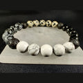 Howlite, snowflake obsidian, black tourmaline, and dalmatian jasper bracelet with lava rock image 0