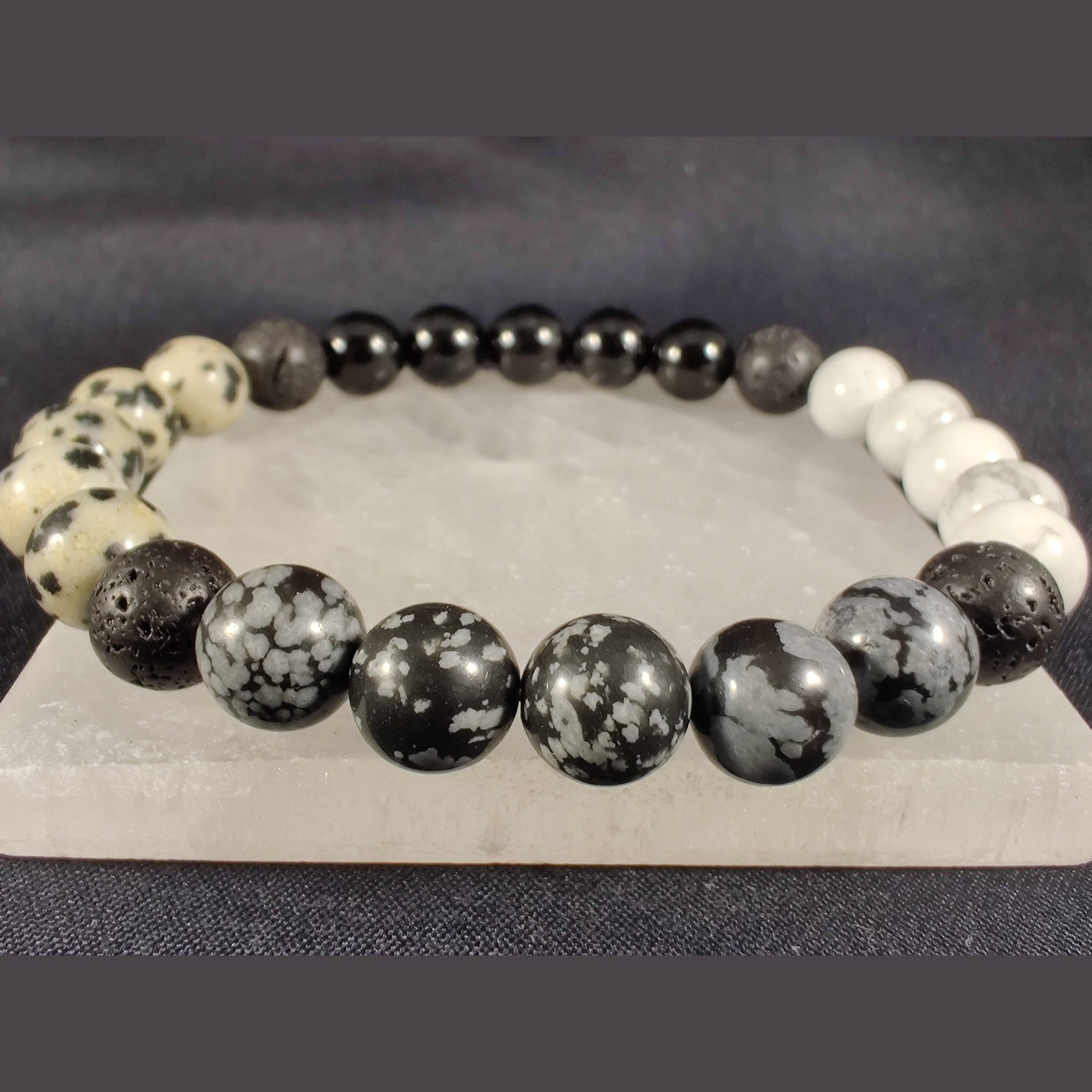 Howlite, snowflake obsidian, black tourmaline, and dalmatian jasper bracelet with lava rock image 1