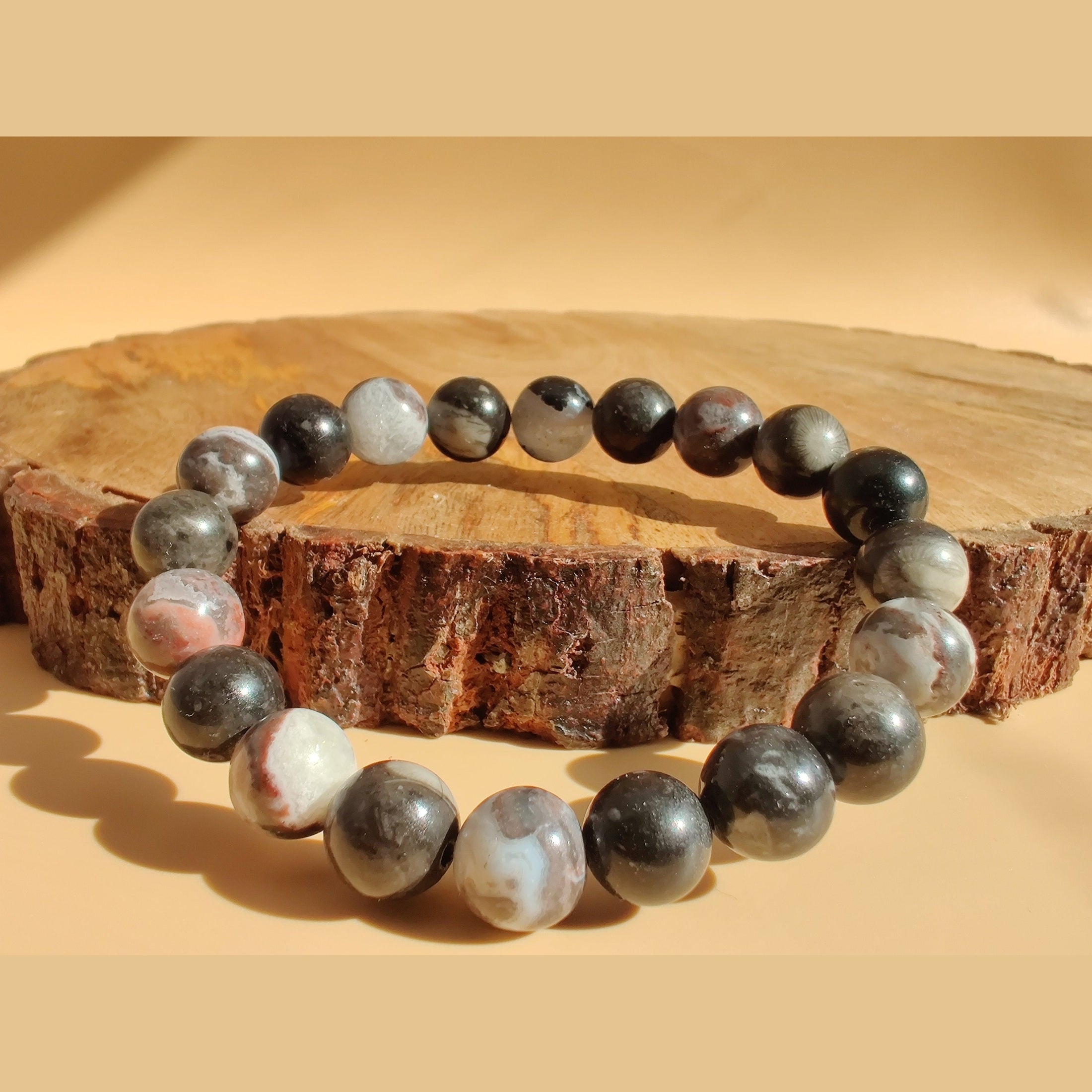 Mexican zebra jasper and orthoceras fossil stretch bracelet image 0